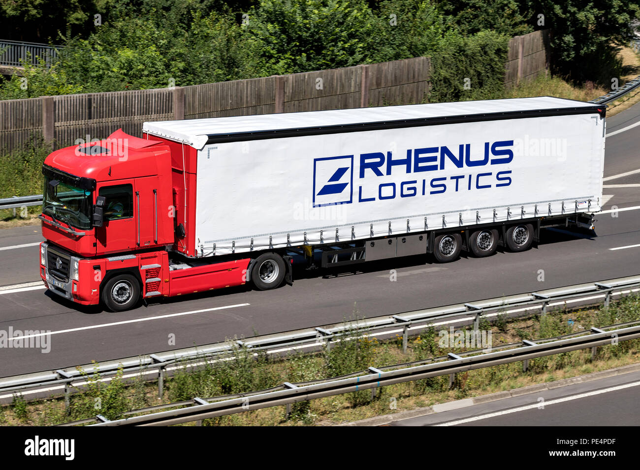 Rhenus truck on motorway. Rhenus Group is a global logistics service company with more than 610 locations worldwide and 29,000 employers. Stock Photo