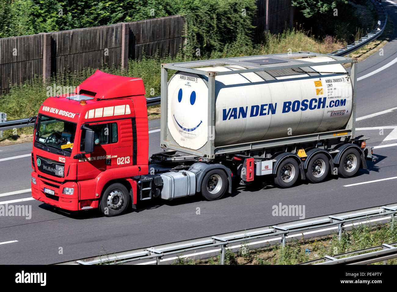 Van den Bosch truck on motorway. Van den Bosch Transporten is a leading international logistic services provider, based in Erk, the Netherlands. Stock Photo