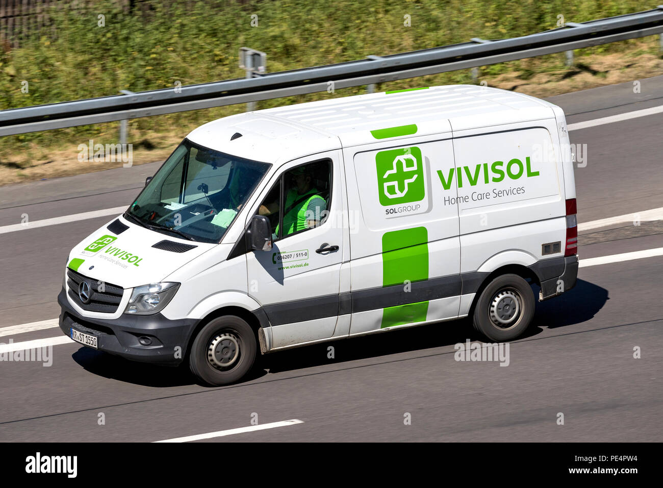 Vivisol van on motorway. Vivisol is one of the premier European groups working in the home care sector Stock Photo