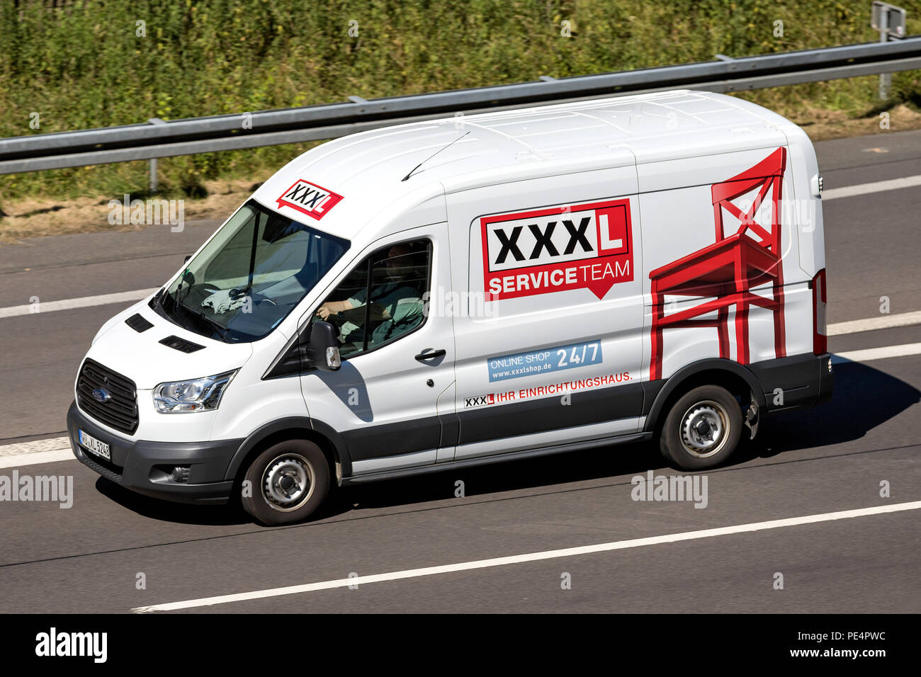 XXXL van on motorway. Austria based XXXLutz is the second largest furniture retailer in the world. Stock Photo