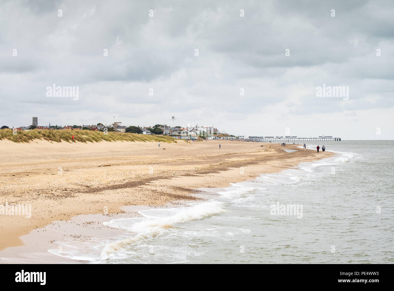 Southwold church, pier, brewery, lighthouse and beach on a cold, grey day Stock Photo