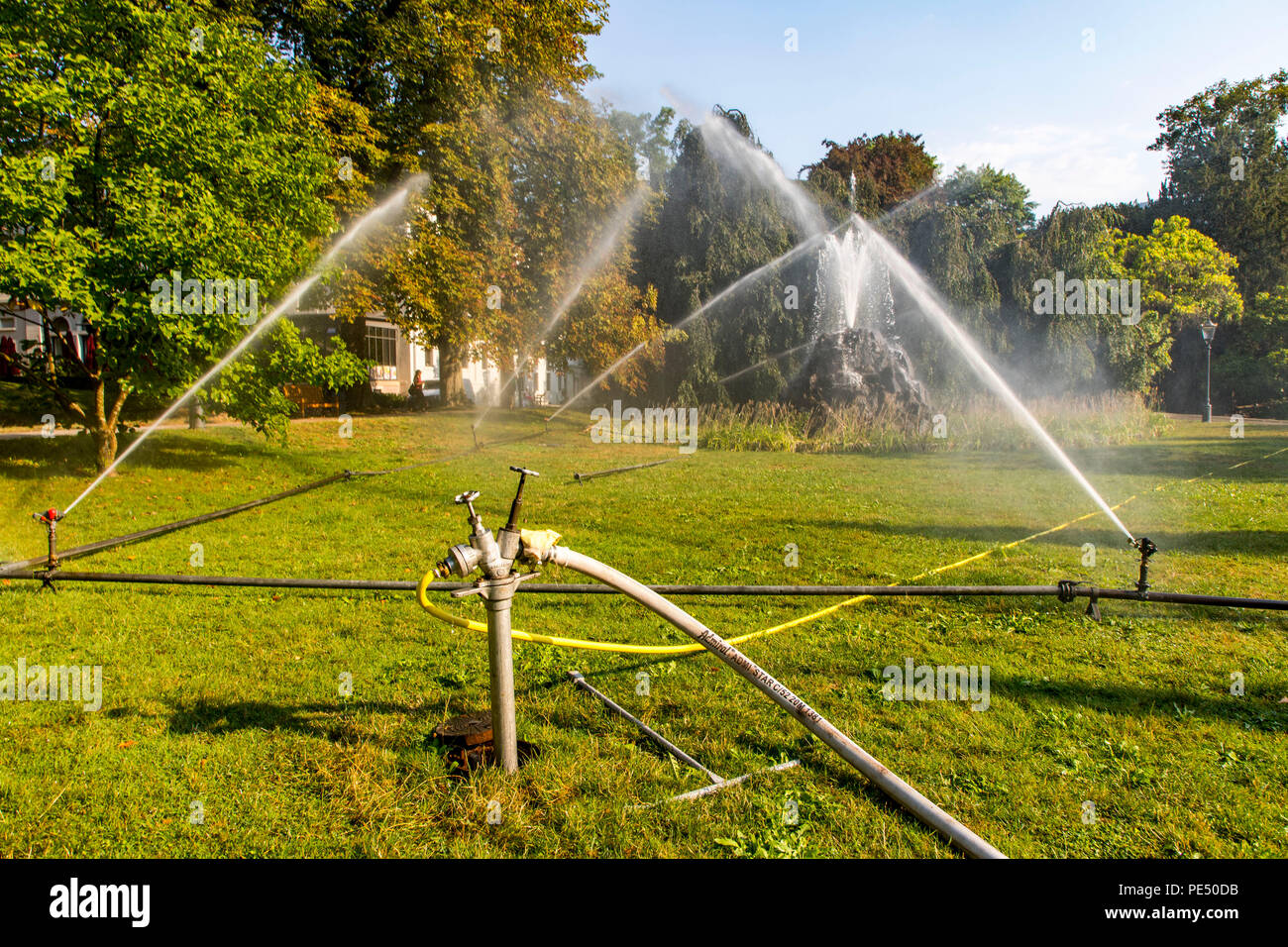 Baden-Baden, Lichtentaler Allee park, watering in the morning, irrigation of the green areas, while the whole of Germany is moaning under the summer h Stock Photo