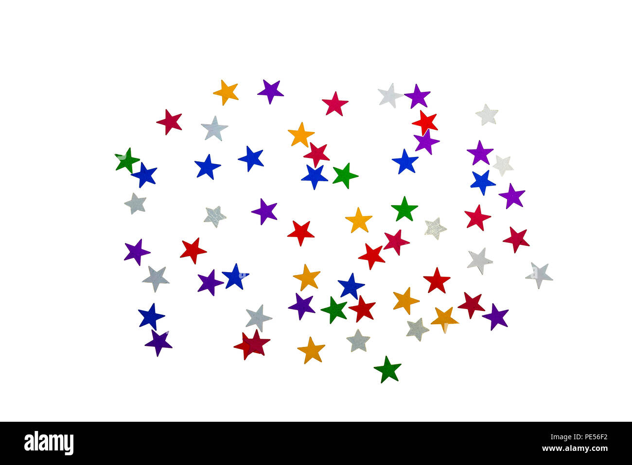 Colourful foil stars laid in an abstract pattern on white. Stock Photo