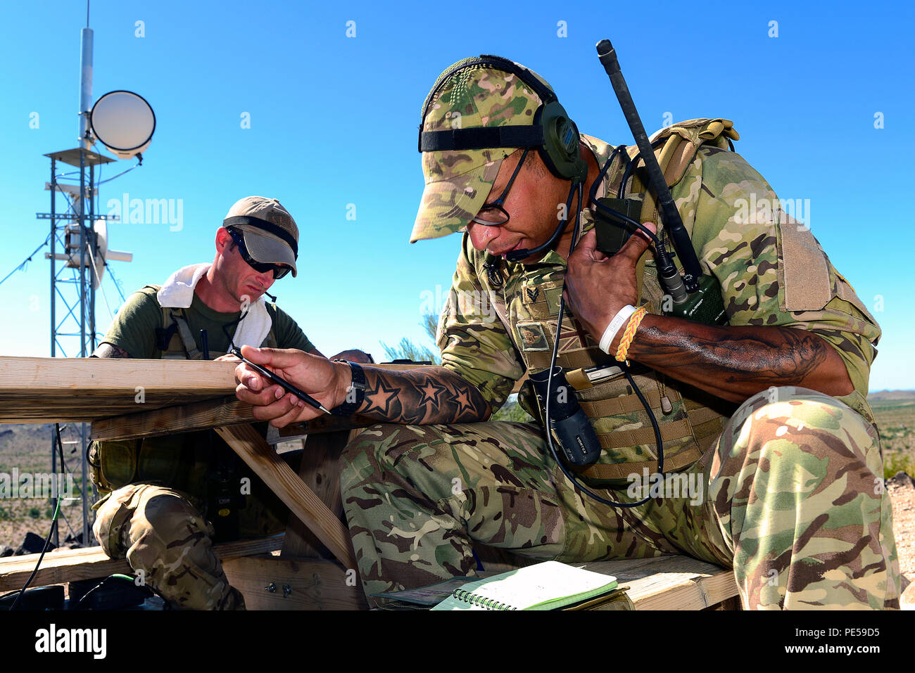 British army Sgt. Daniel Campbell, Royal Lancers joint tactical air  controller, relays target information to aircraft at Barry M. Goldwater  Range, Ariz., Sept. 23, 2015. The abundance of air traffic at BMGR