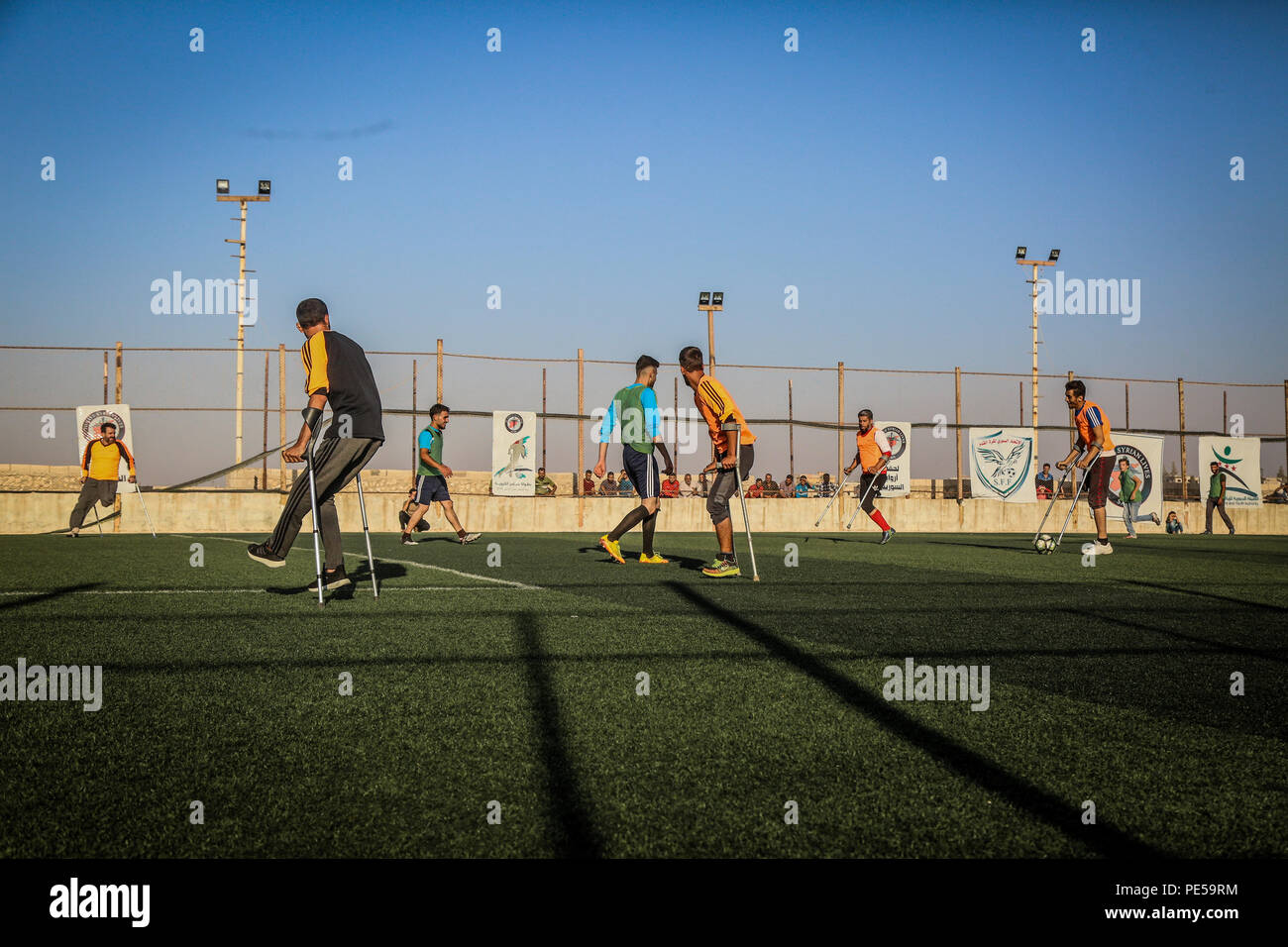 The disabled youths are seen playing soccer. A group of Syrian youths who have been injured and disabled as a result of the war came together and created a football team. The team has started in early 2018 and their dream is to be able to take part in the Paralympic games in 2020. Stock Photo