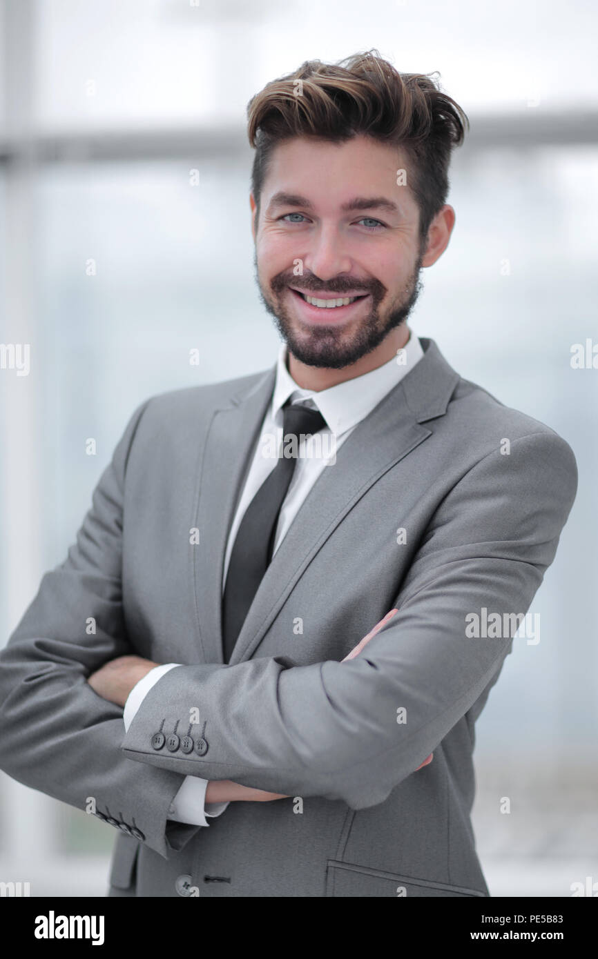 A young man in a gray suit Stock Photo - Alamy