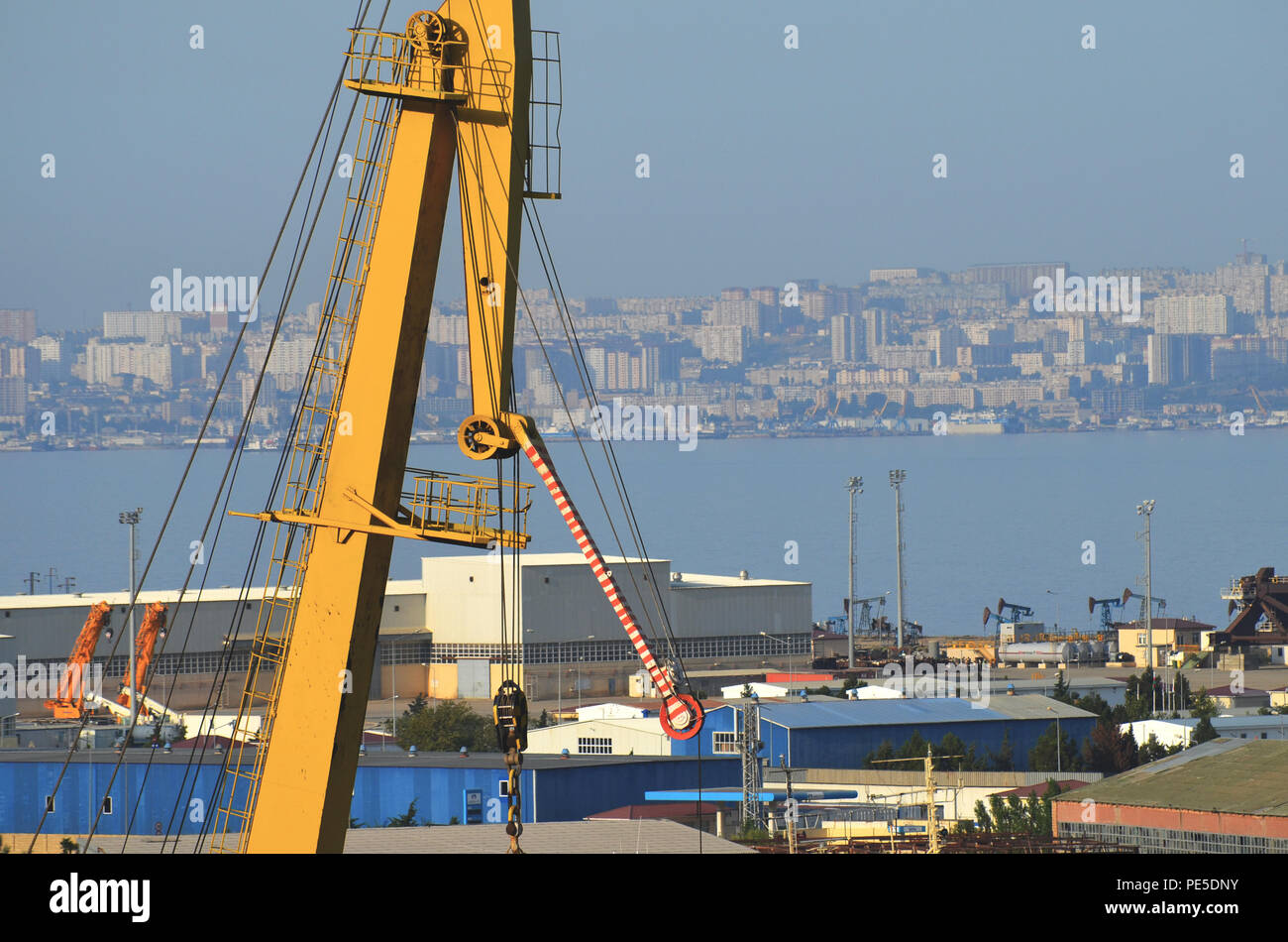Cranes and vessels at Bibiheybat shipyard in metropolitan Baku (Azerbaijan), Caspian Sea Stock Photo