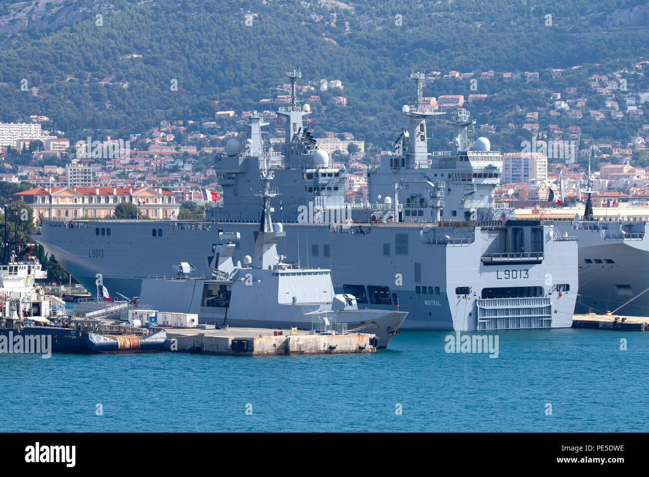 Dixmude L9013 an amphibious assault ship of the French Navy docked at the  major French naval base in Toulon in southern France Stock Photo - Alamy