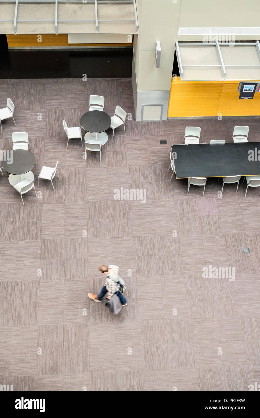 Bird eye view of table and chairs office building lobby hires stock