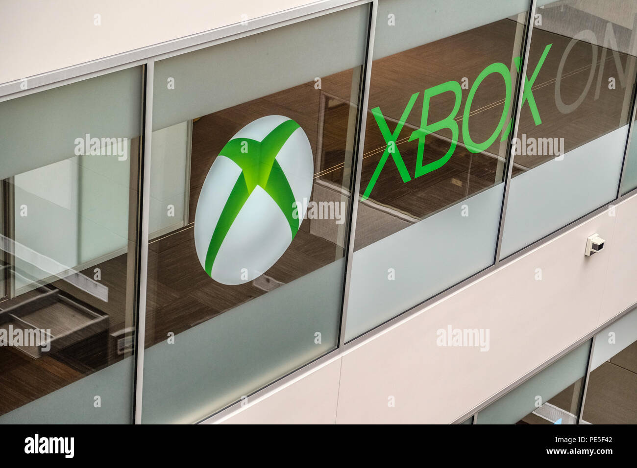 Xbox logo on windows Inside the Microsoft Xbox office building Stock Photo  - Alamy