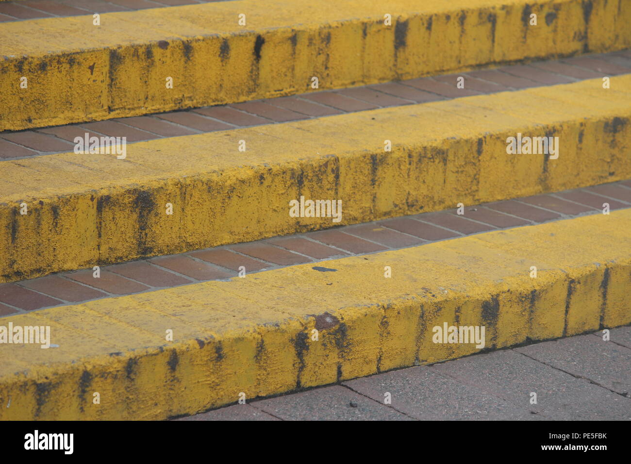 High visibility steps with yellow painted edges in Canberra city, Australia. Stock Photo
