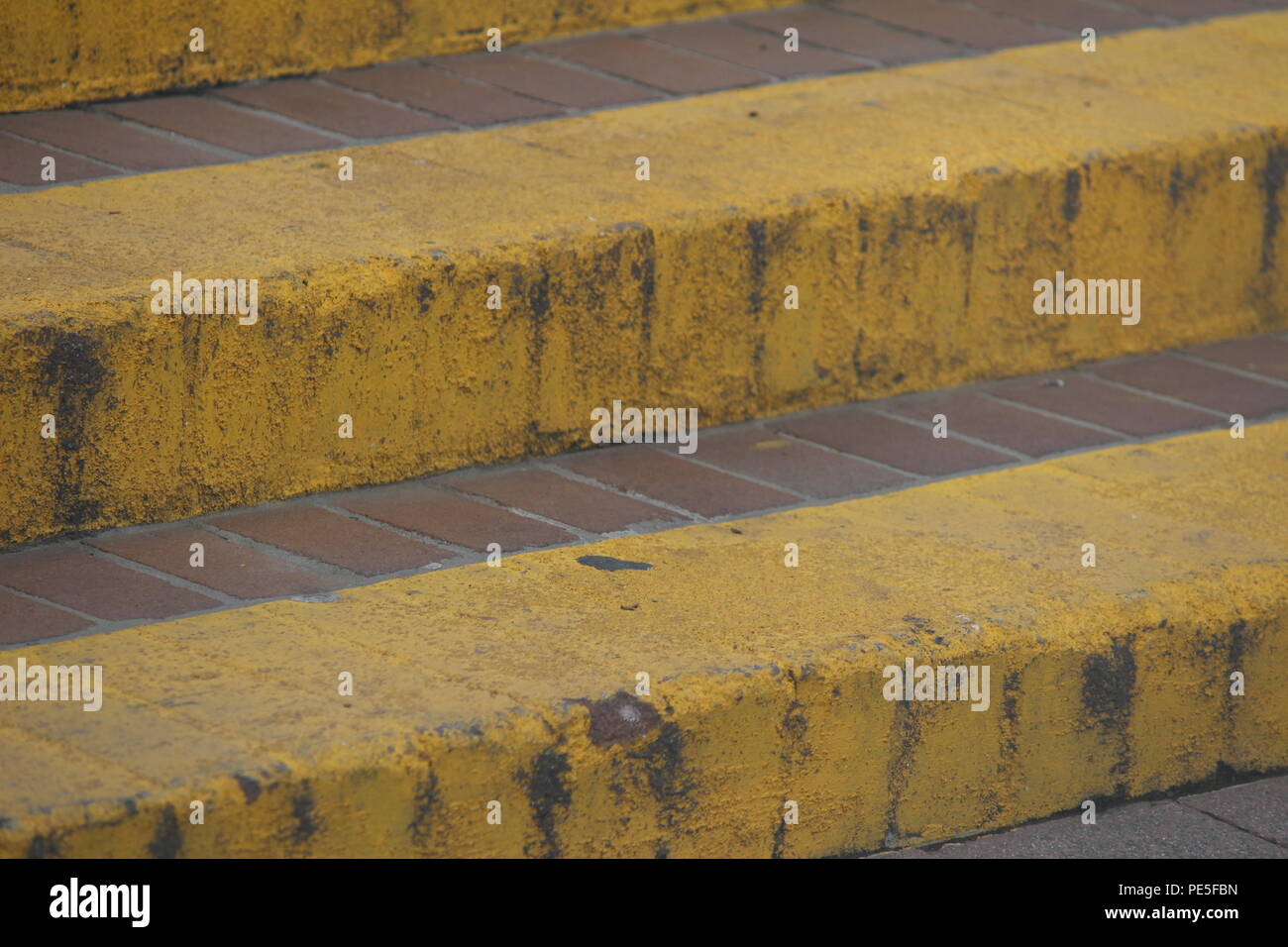 High visibility steps with yellow painted edges in Canberra city, Australia. Stock Photo