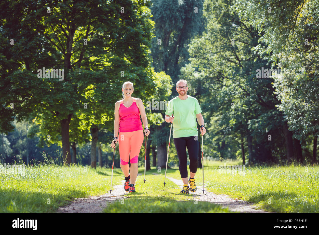 Couple doing Nordic Walking for sport Stock Photo