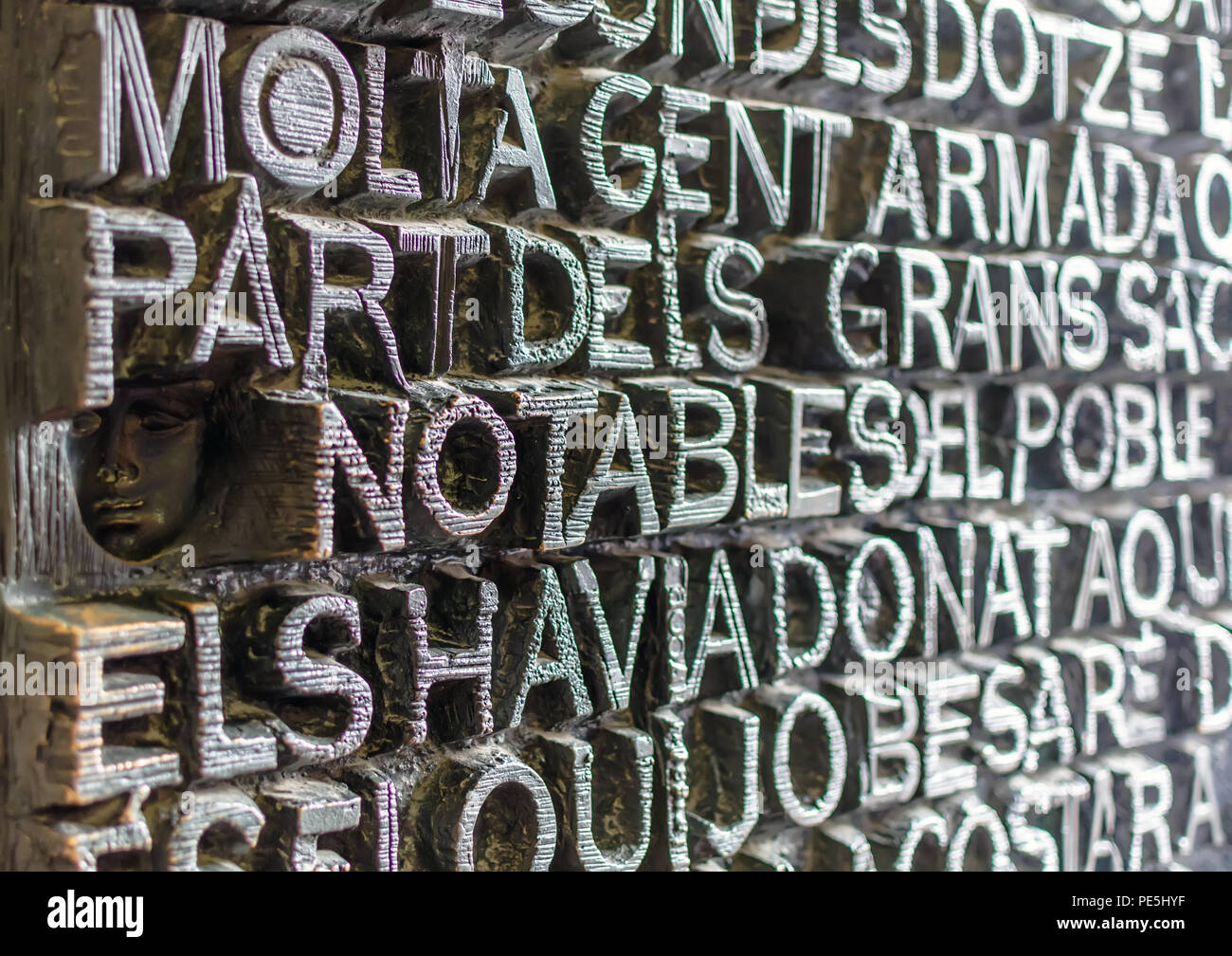 Detail of the bronze door of Passion facade of Sagrada Familia in  Barcelona. The gospel doors contain text from the New Testament depicting  the Passio Stock Photo - Alamy
