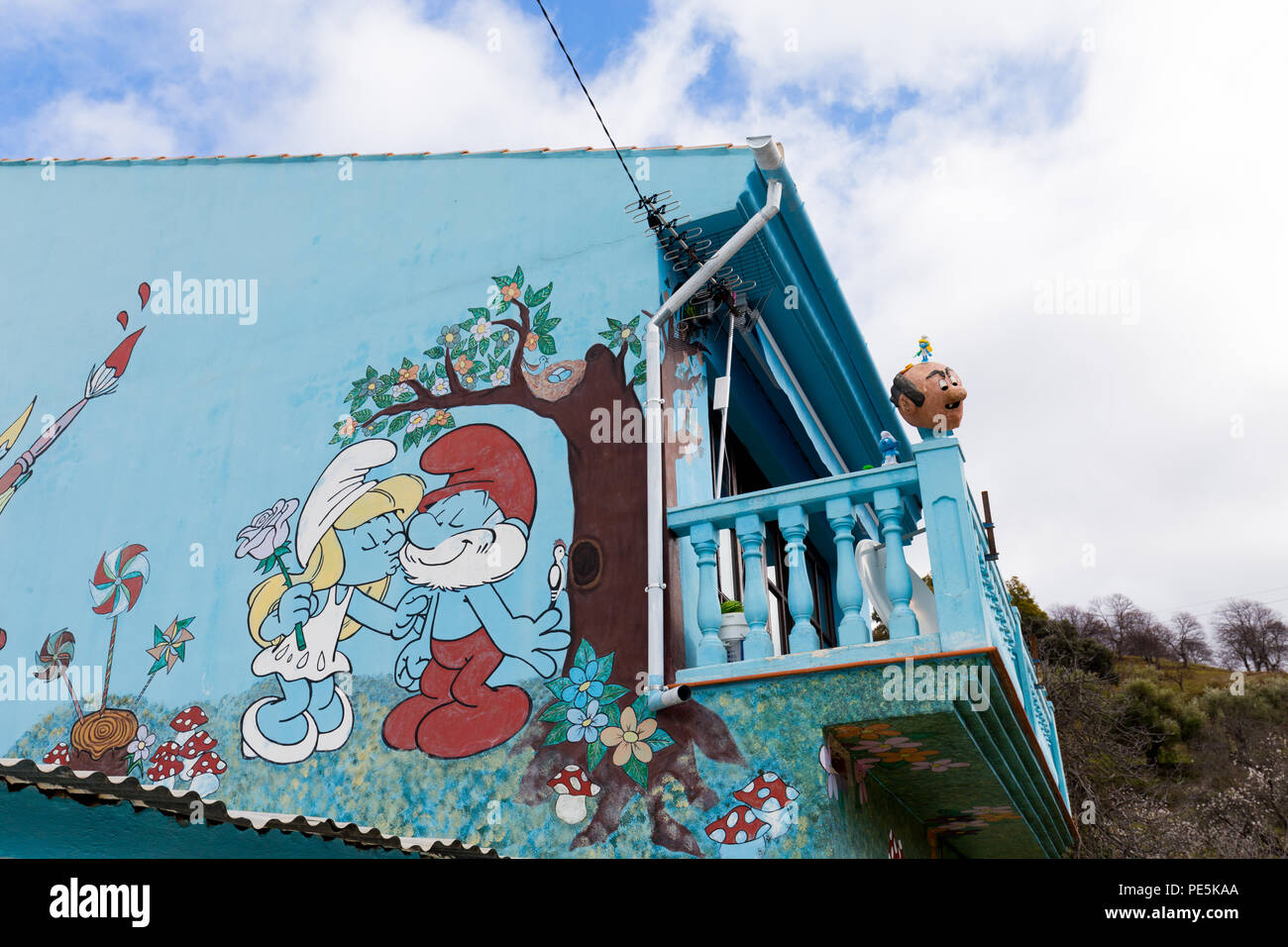 Juzcar buildings in the village (including the church) were painted smurf-blue by Sony España to celebrate the premiere of the Smurfs movie. Stock Photo