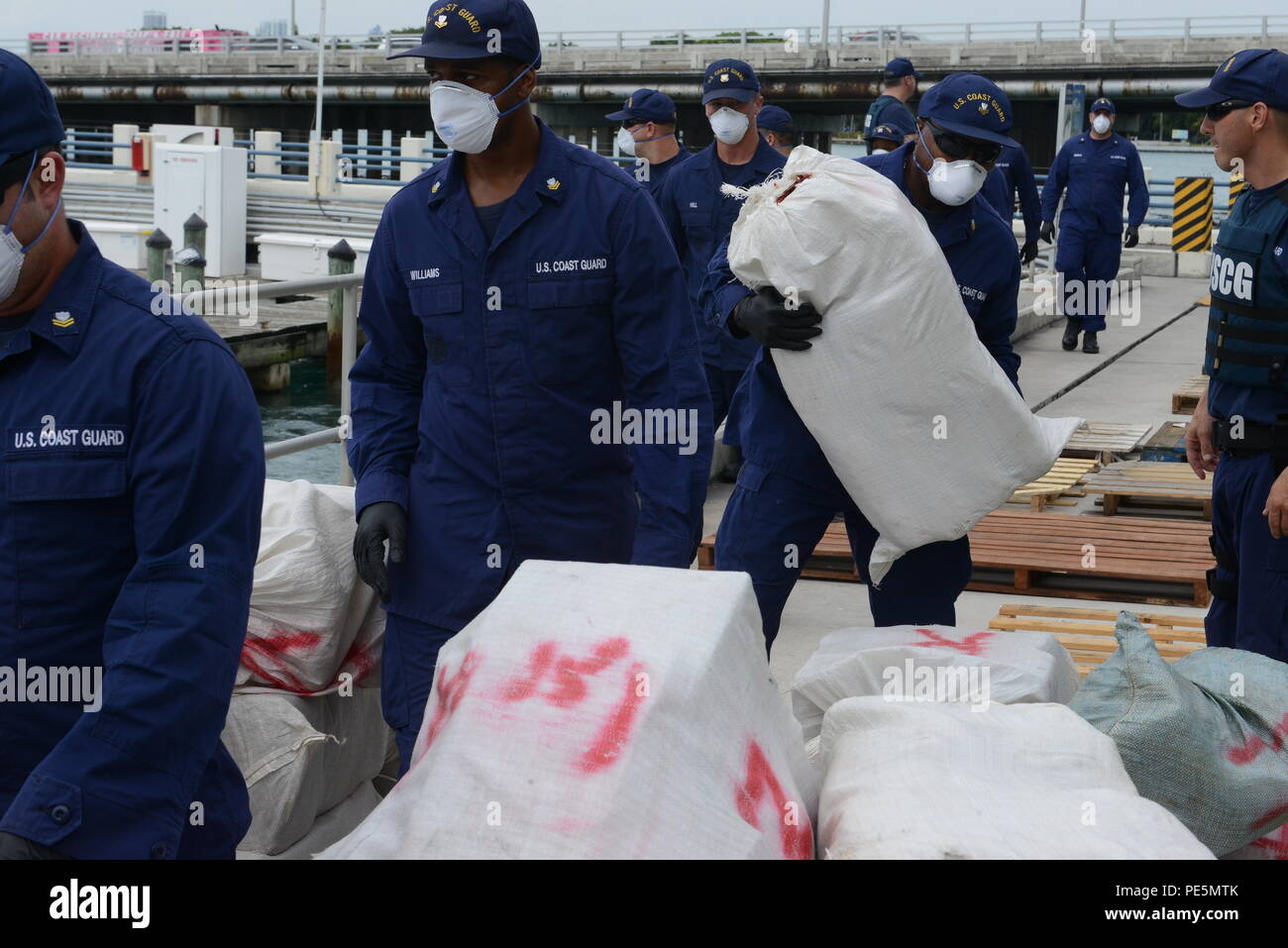 Coast Guardsmen offloaded bales of cocaine and marijuana at Coast Guard ...