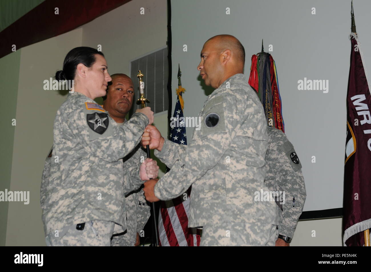 The final step in the change of responsibility ceremony is shown, when Command Sgt. Maj. Juan M. Loera Jr., the new command sergeant major for the Medical Readiness and Training Command, releases the noncommissioned officer sword back to the sword custodian, Staff Sgt. Jamie Stockton, Surgeon Section, AR-MEDCOM, the morning of Sept. 24, 2015, here at the Army Reserve Medical Command Headquarters. Stock Photo