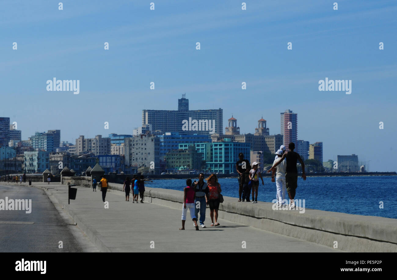 Cuban people at the Malecon in Havanna City. Stock Photo