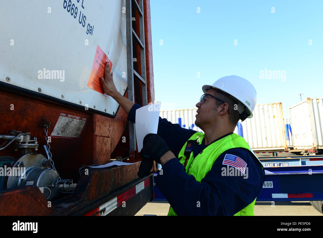 Petty Officer 3rd Class Matthew Norman, a marine science technician assigned to the container