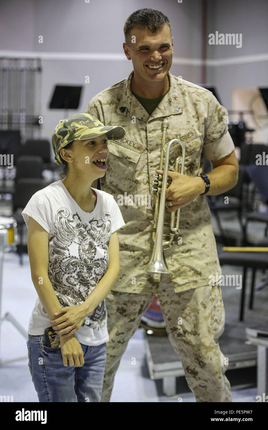 Amber N. Carter, left, a resident of Hubert, N.C., stands alongside Sgt ...
