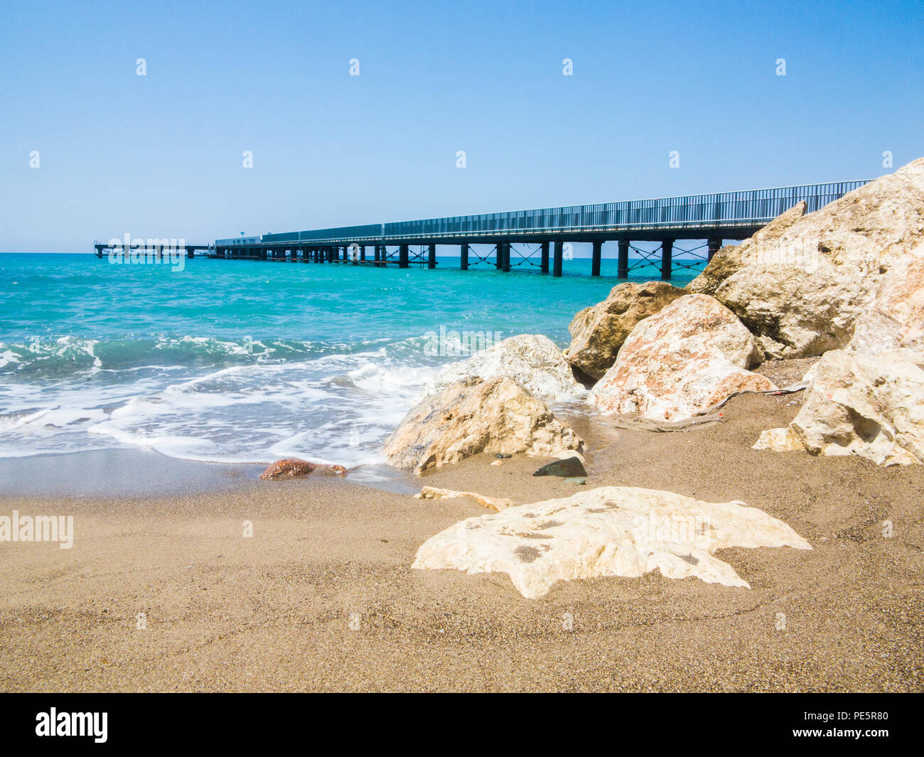 A long pier on the Mediterranean coast near the town of Polis Stock Photo