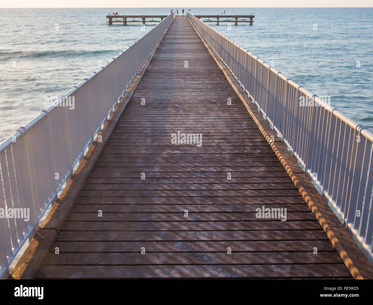 A long pier on the Mediterranean coast near the town of Polis Stock Photo