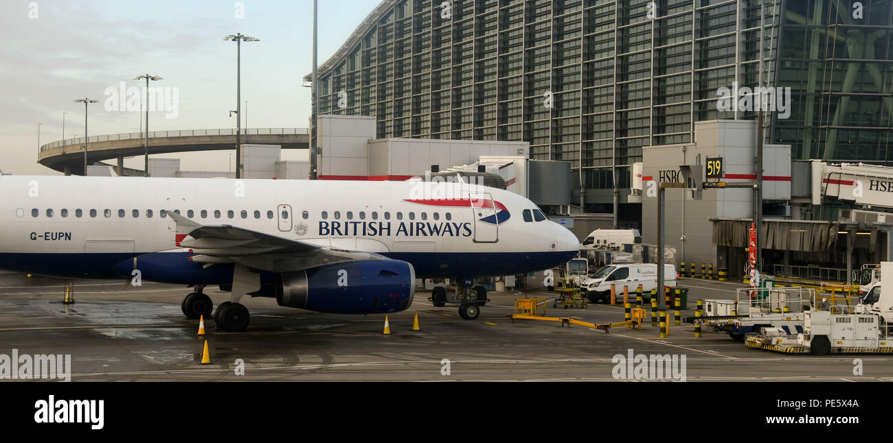 British Airways Airbus A319 short haul aircraft parked at terminal 5 at at London Heathrow Airport Stock Photo