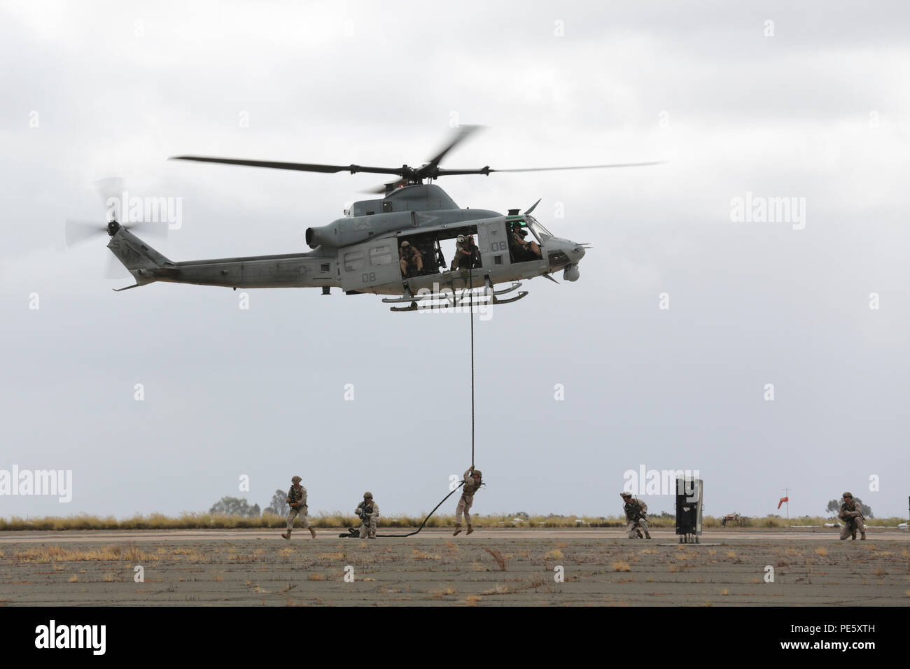 Marines fast rope from a UH-1Y Venom helicopter during a Marine Air ...