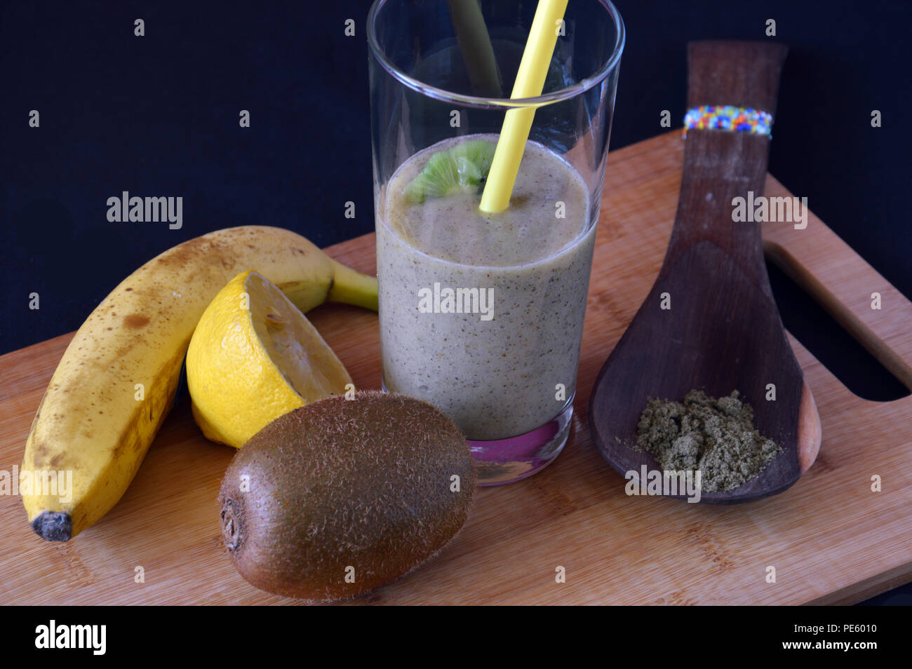 fruit shake with kiwi, banana, lemon juice and hemp protein Stock Photo