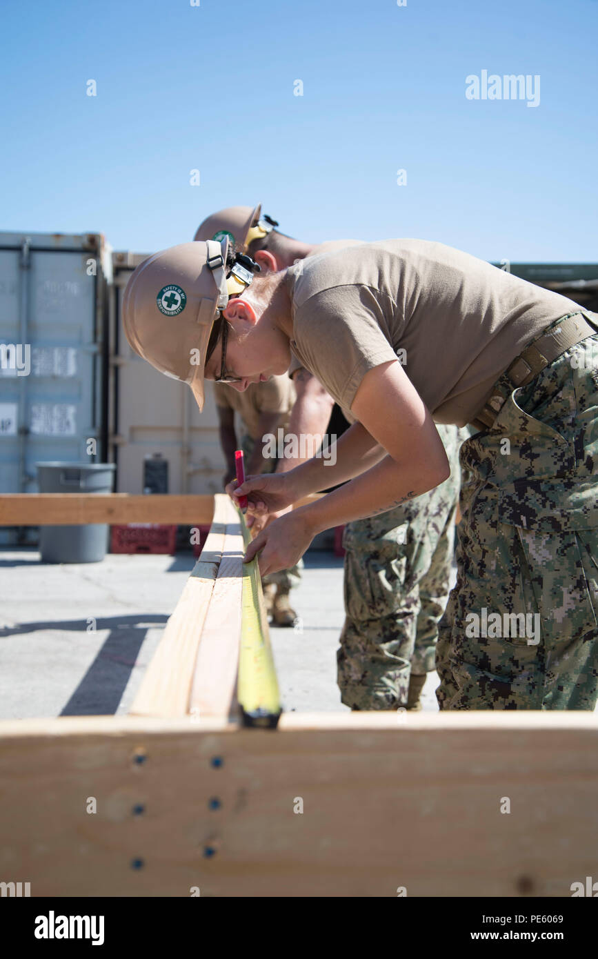 Acb Inls A builder from Amphibious Construction Battalion 1, Charlie Company ...