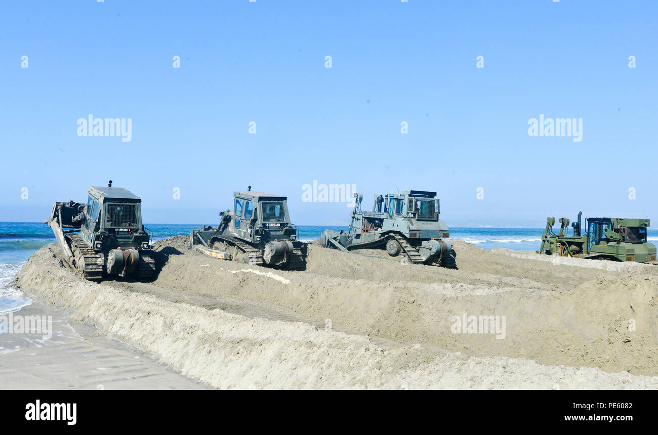 Acb Inls Seabees from Amphibious Construction Battalion 1, Alfa Company, operate ...