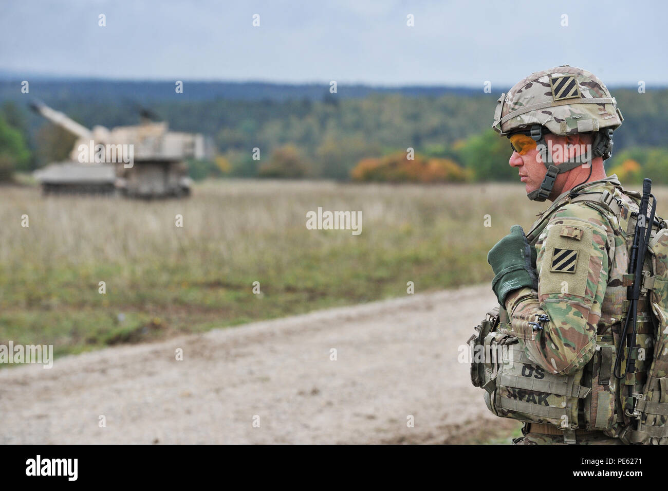U.S. Army Staff Sgt. Christopher Balvanz, assigned to Charley Battery ...