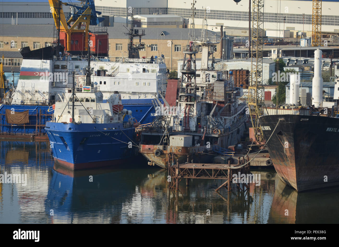 Offshore oil and gas industry vessels at Bibiheybat shipyard in metropolitan Baku (Azerbaijan), Caspian Sea Stock Photo