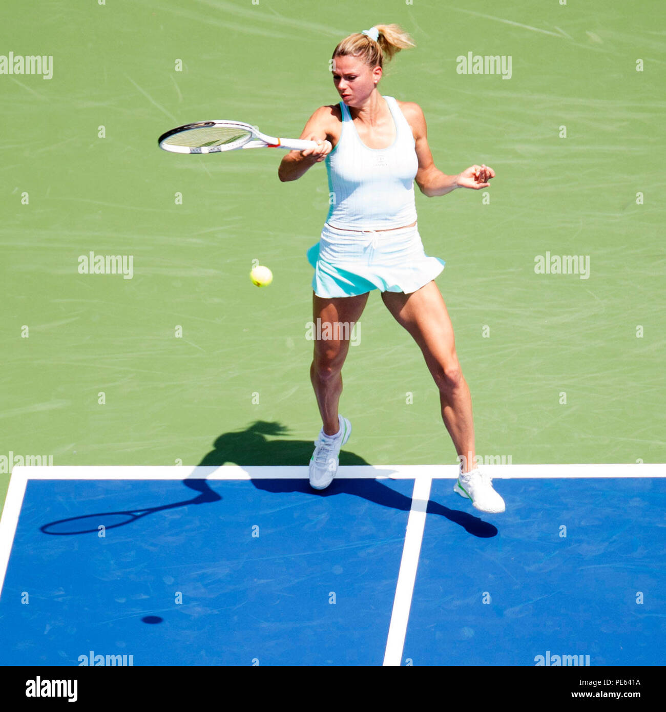 Ohio, USA. August 12, 2018: Camila Giorgi (ITA) hits the ball back to Viktoria Kumova (SVK) at the Western Southern Open in Mason, Ohio, USA. Brent Clark/Alamy Live News Stock Photo