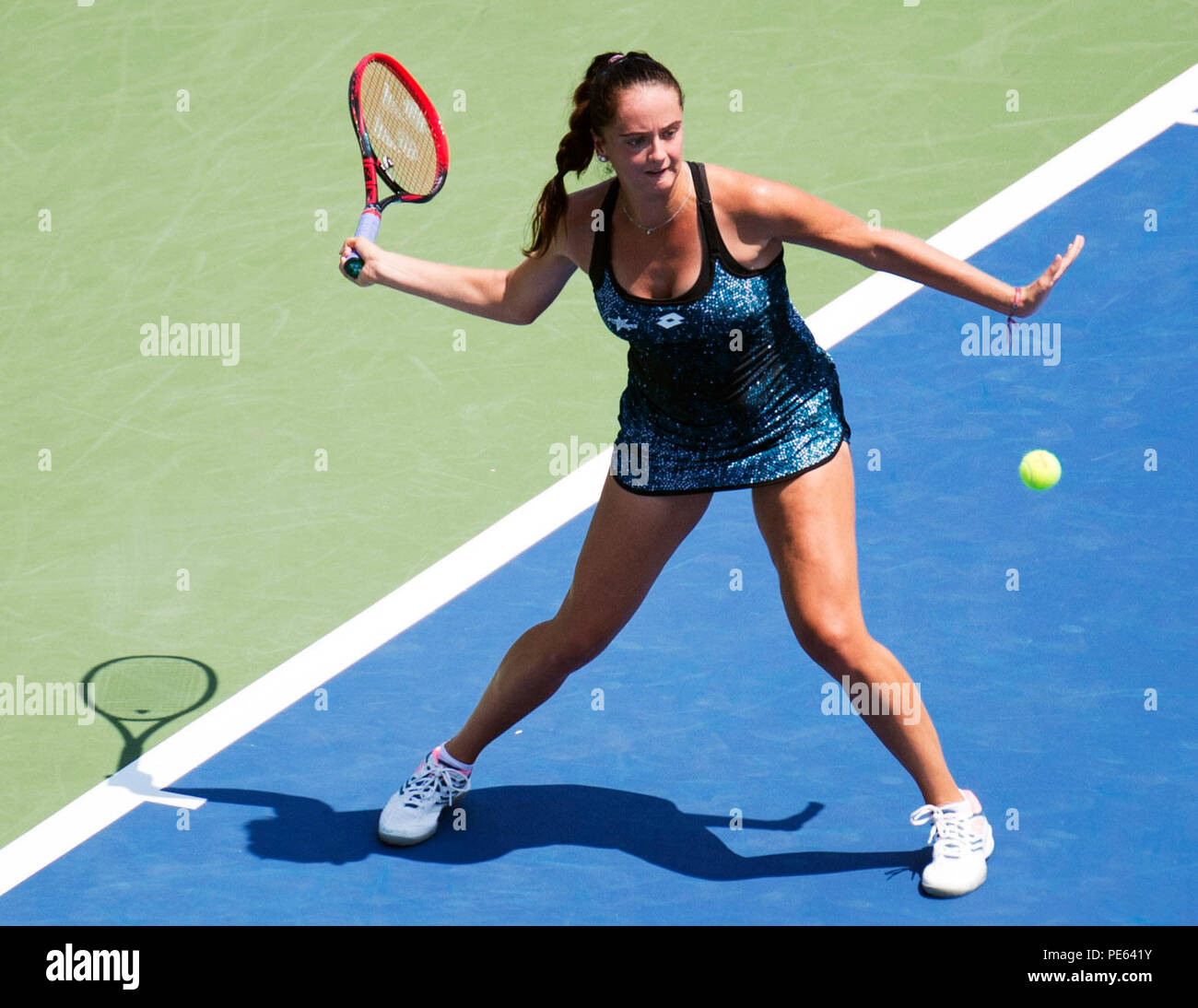 Ohio, USA. August 12, 2018: Viktoria Kuzmova (SVK) hits the ball back to Camila Giorgi (ITA) at the Western Southern Open in Mason, Ohio, USA. Brent Clark/Alamy Live News Stock Photo