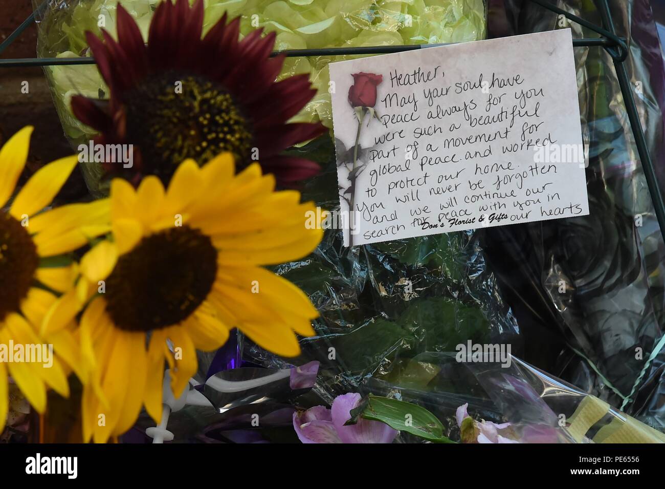 (180812) -- WASHINGTON, Aug. 12, 2018 (Xinhua) -- A condolent message is seen at the street corner where Heather Heyer was killed in Charlottesville, Virginia, the United States, on Aug. 10, 2018. A year after a white nationalist rally traumatized Charlottesville, in the U.S. state of Virginia, with riots and blood, the city is still healing from the shock. On Aug. 12, 2017, white supremacists and members of other hate groups gathered in Charlottesville for a self-styled "Unite the Right" rally to protest against the city's decision to remove a Confederate statue before clashing violently with Stock Photo