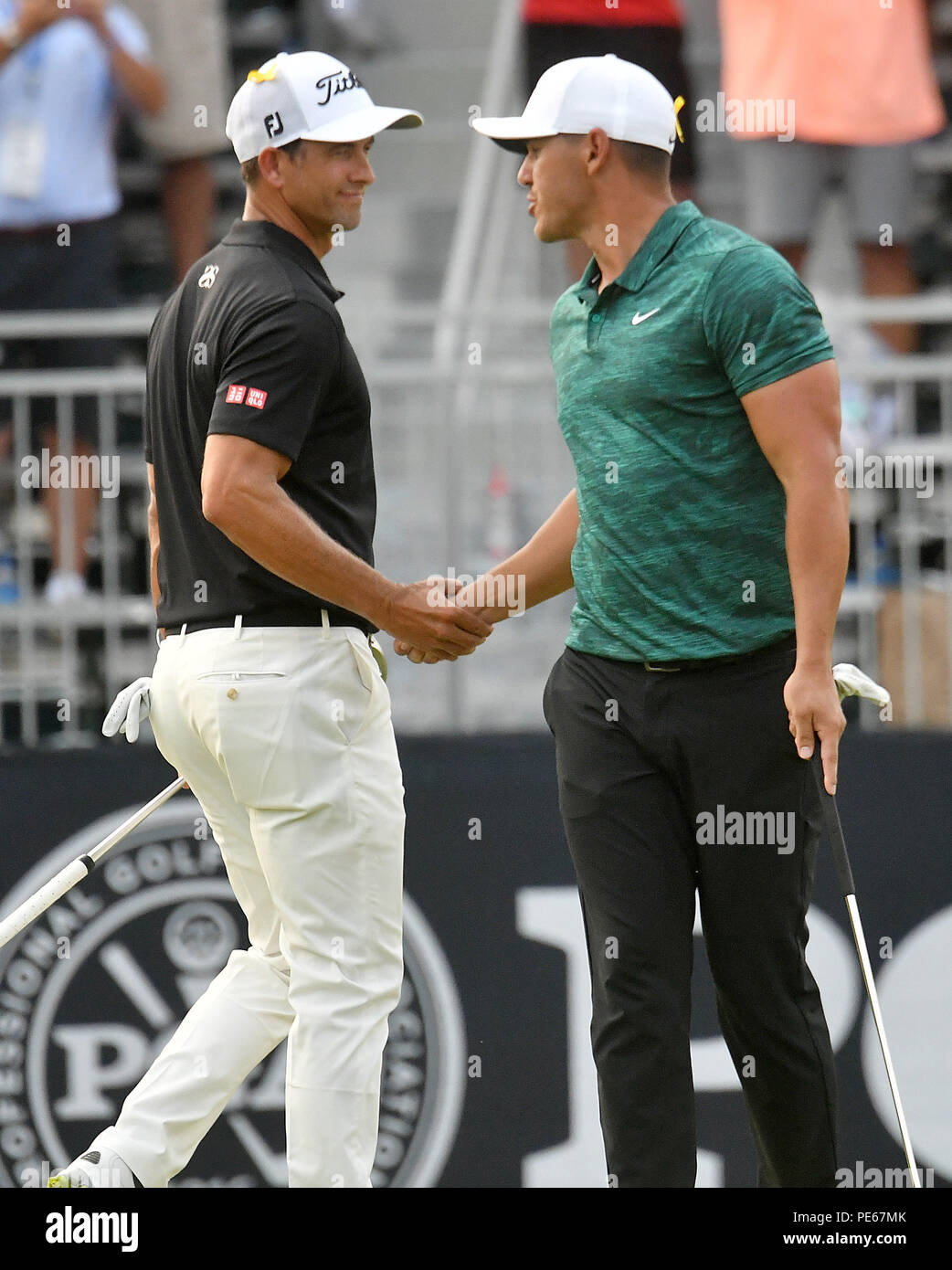St Louis, MO, USA. 12th Aug, 2018. Adam Scott congratulates Brooks Koepka for winning the PGA Championship on August 12, 2018, at Bellerive Country Club, St. Louis, MO. Credit: Action Plus Sports/Alamy Live News Stock Photo