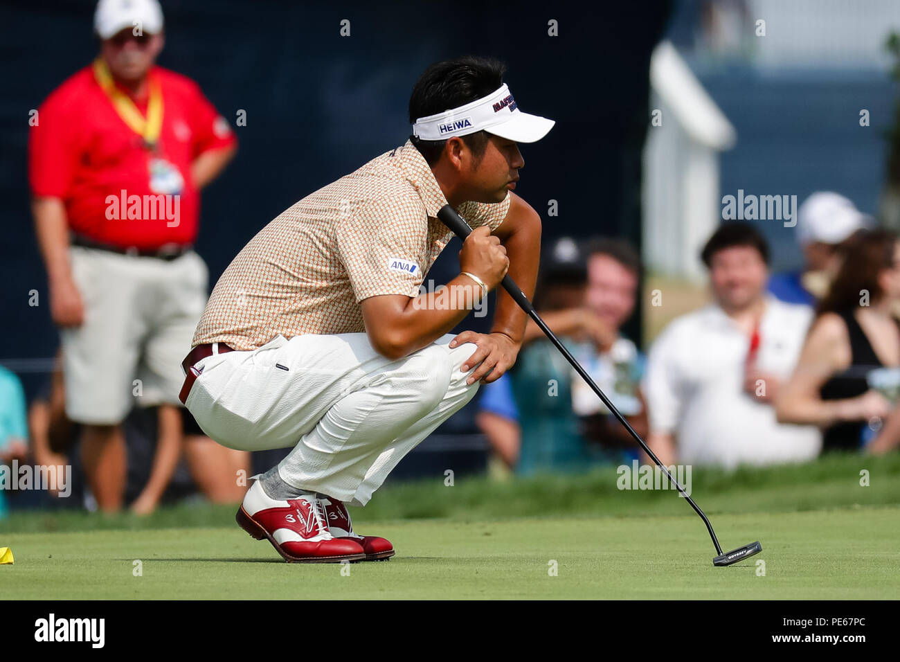 St Louis, MO, USA. 12th Aug, 2018. Yuta Ikeda (JPN) lines up his putt on the third green during the PGA Championship August 12, 2018, at Bellerive Country Club in St. Louis, MO. Credit: Action Plus Sports/Alamy Live News Stock Photo