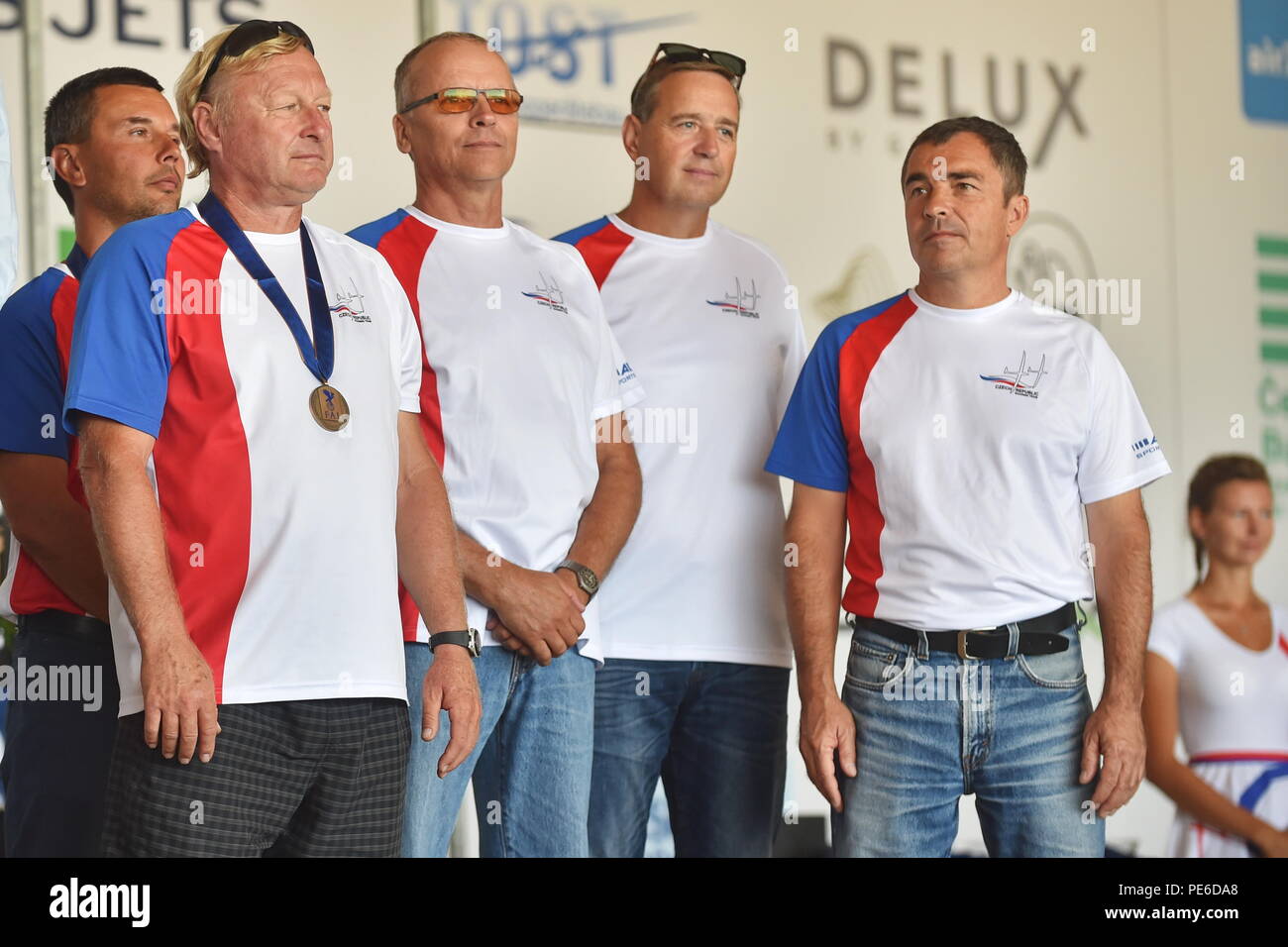 L-R) Third placed Czech team Petr Tichy, Petr Krejcirik, Roman Mracek,  Michal Lesinger and Tomas Suchanek pose with medal at the 35th FIA World  Gliding Championships in Hosin, Czech Republic, August 12,