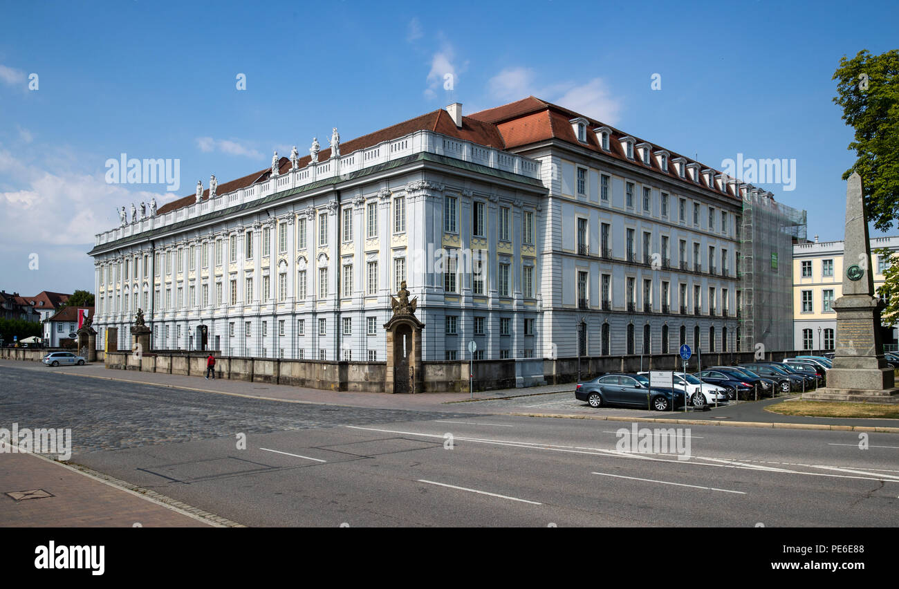 18 July 2018, Germany, Ansbach: The exterior view shows the Residenz Ansbach (lit. Ansbach Residence), where the district government of Central Franconia and the Bavarian State Office for Data Protection Supervision are located. The transformation into a baroque margrave's residence began according to official data by the court architect Gabriel de Gabrieli, who built the eastern part of the court arcades from 1708 to 1709 and the eastern part of the south-east wing from 1713 to 1716. Photo: Daniel Karmann/dpa Stock Photo