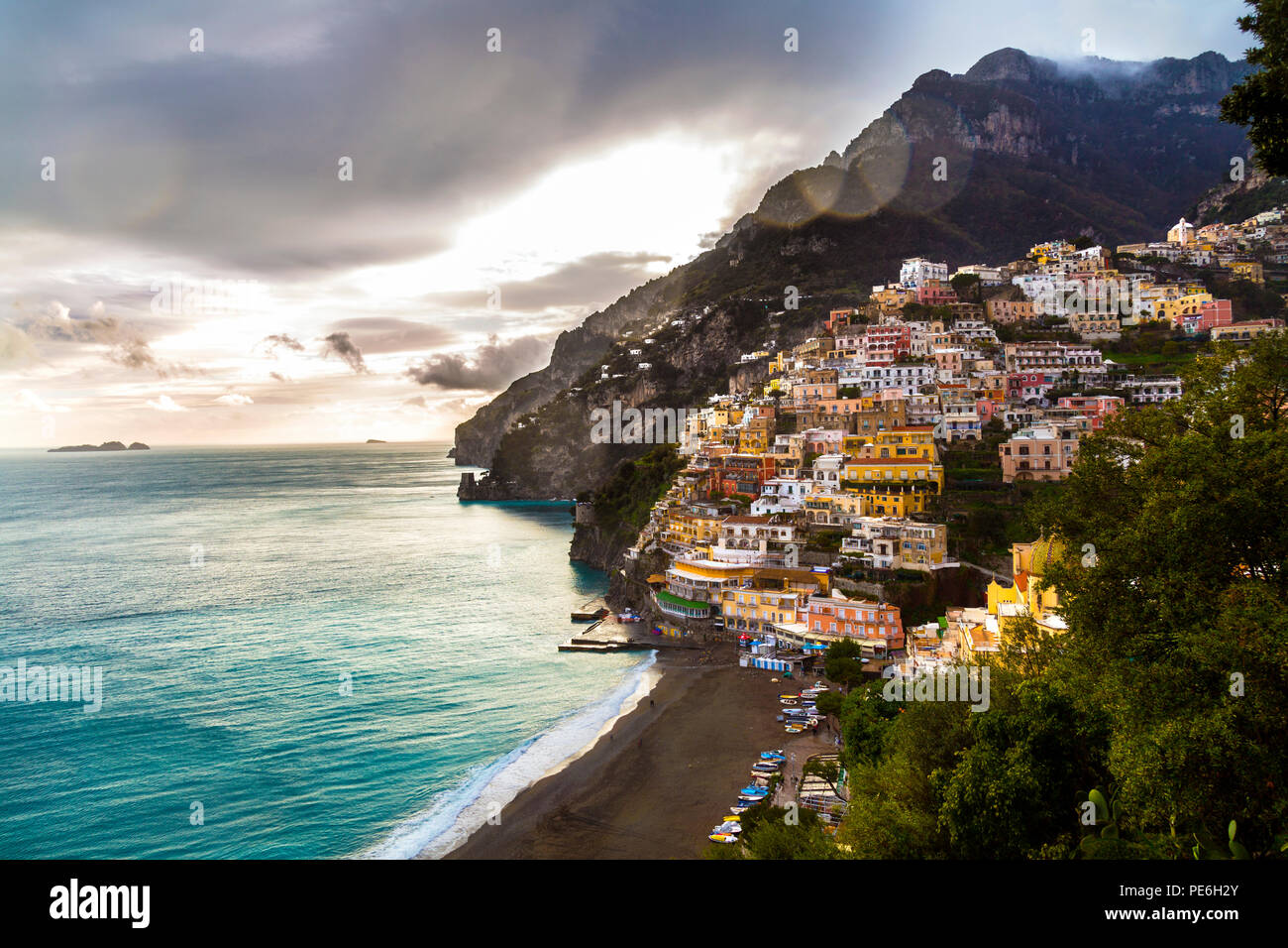 Scenic view of a hillside town at sunset, Positano, Campania, Italy Stock Photo
