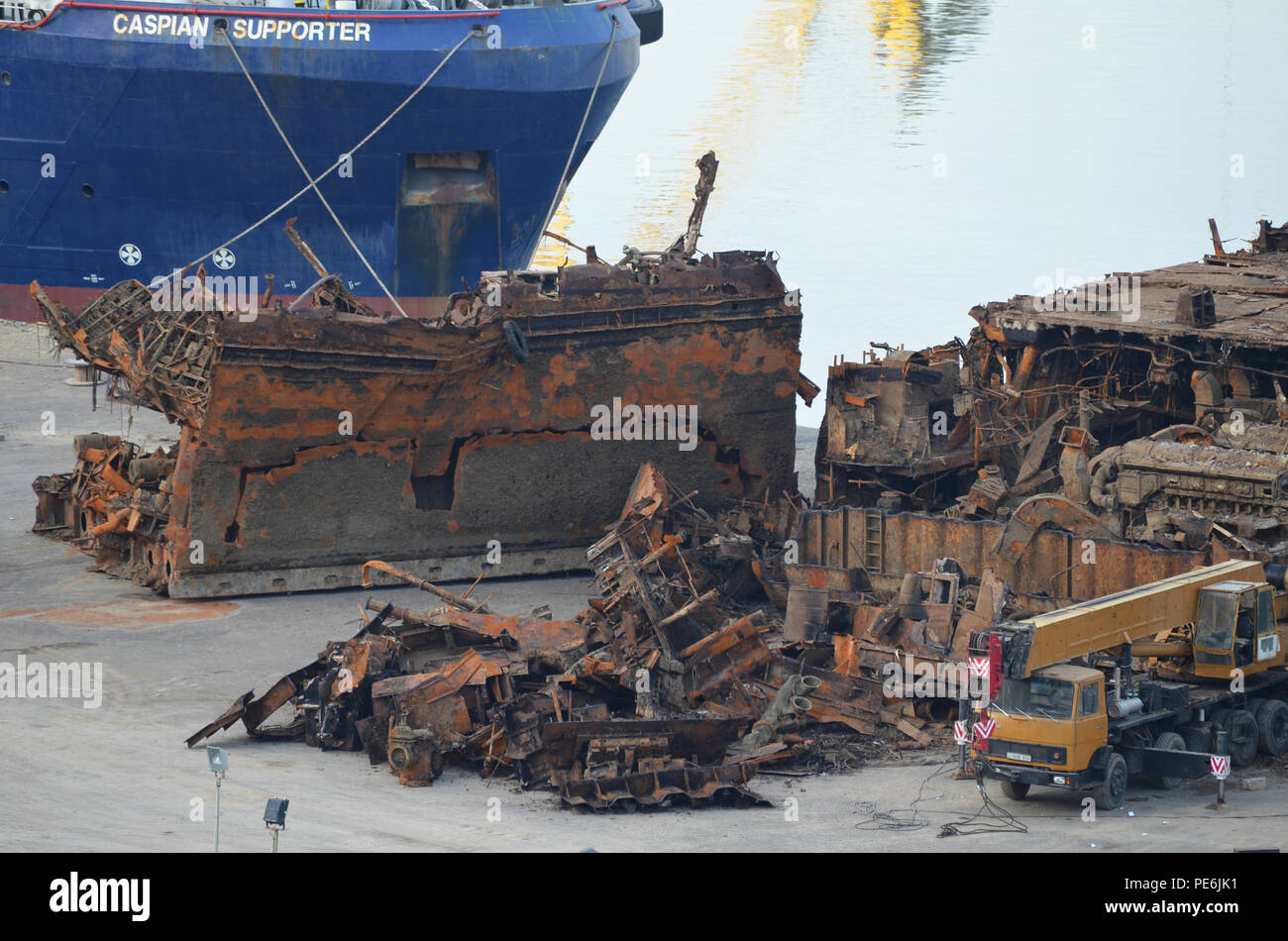 Rusty remains of a scrapped vessel at Bibiheybat shipyard in metropolitan Baku (Azerbaijan), Caspian Sea Stock Photo