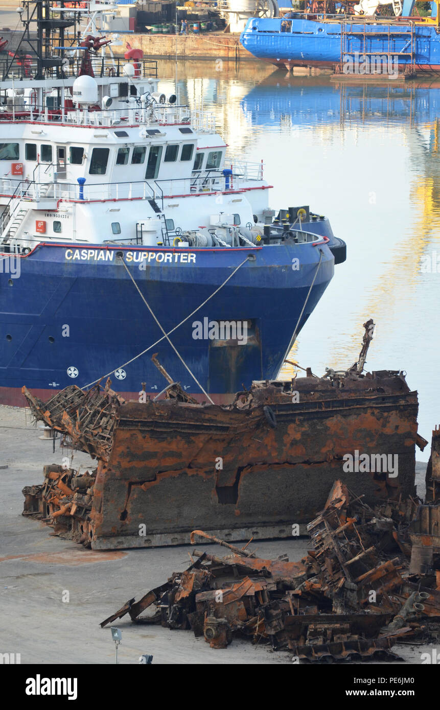 Rusty remains of a scrapped vessel at Bibiheybat shipyard in metropolitan Baku (Azerbaijan), Caspian Sea Stock Photo