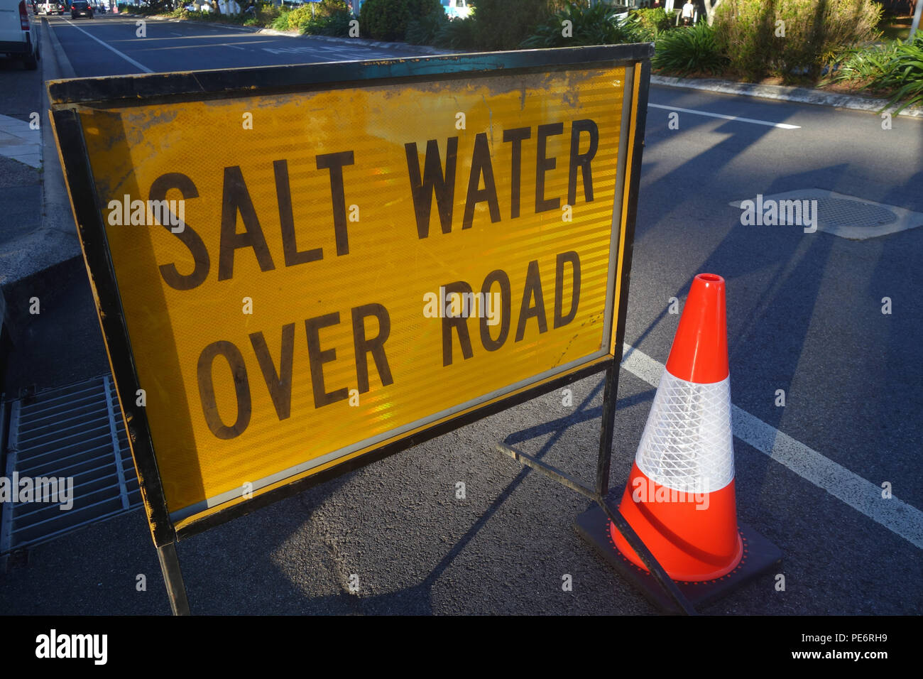 Roadsign warning of salt water over road, Cairns, Queensland, Australia. No PR Stock Photo