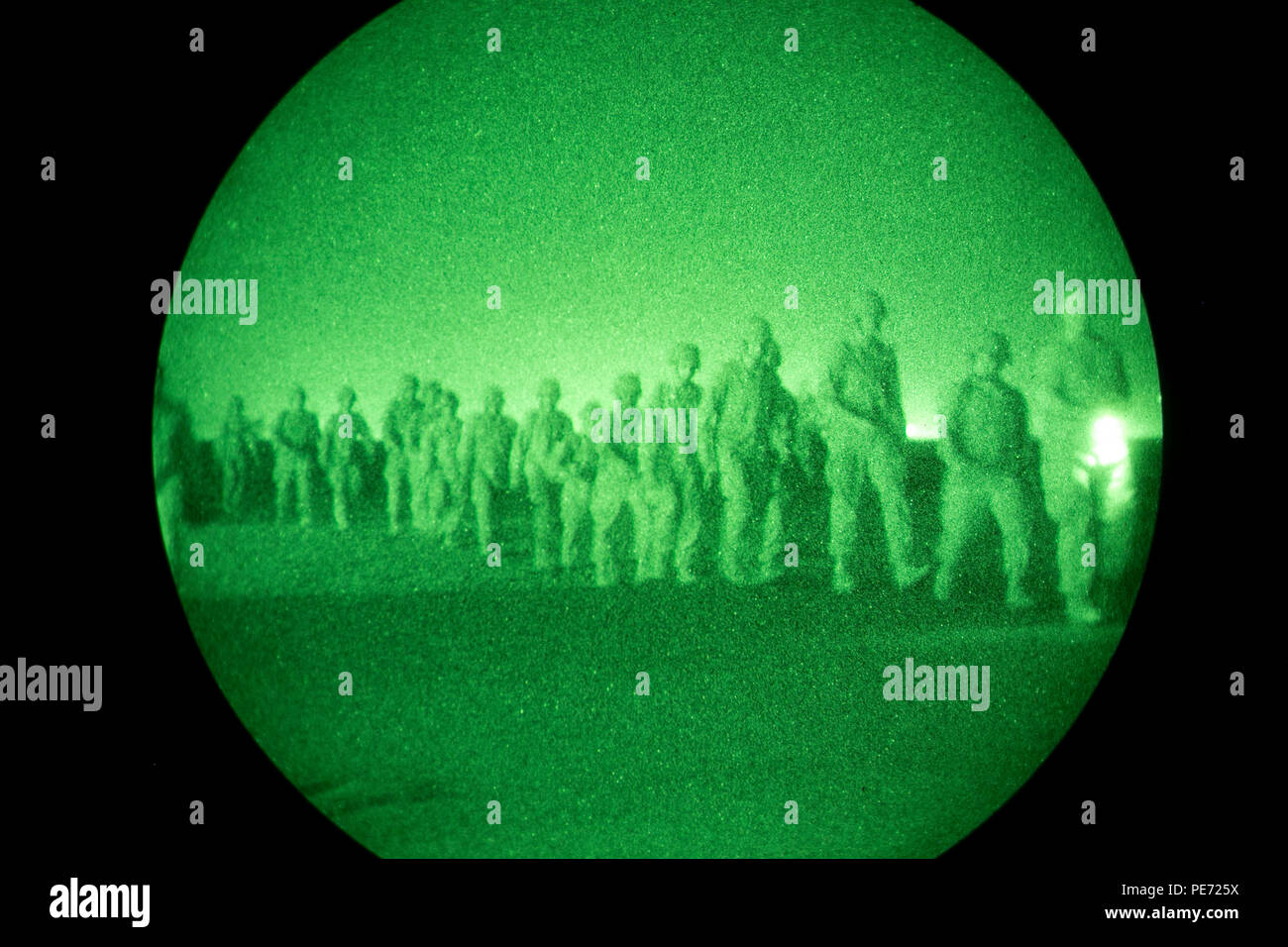 U.S. Marines with 1st Marine Logistics Group, Combat Logistics Regiment 1, board the cargo bay of a KC-130J Hercules in Yuma, Ariz., on Oct. 10, 2015. This training evolution is apart of Weapons and Tactics Instructor (WTI) 1-16, a seven week training event, hosted by Marine Aviation Weapons and Tactics Squadron One (MAWTS-1) cadre, which emphasizes operational integration of the six functions of Marine Corps aviation in support of a  Marine Air Ground Task Force. MAWTS-1 provides standardized advanced tactical training and certification of unit instructor qualifications to support Marine Avia Stock Photo