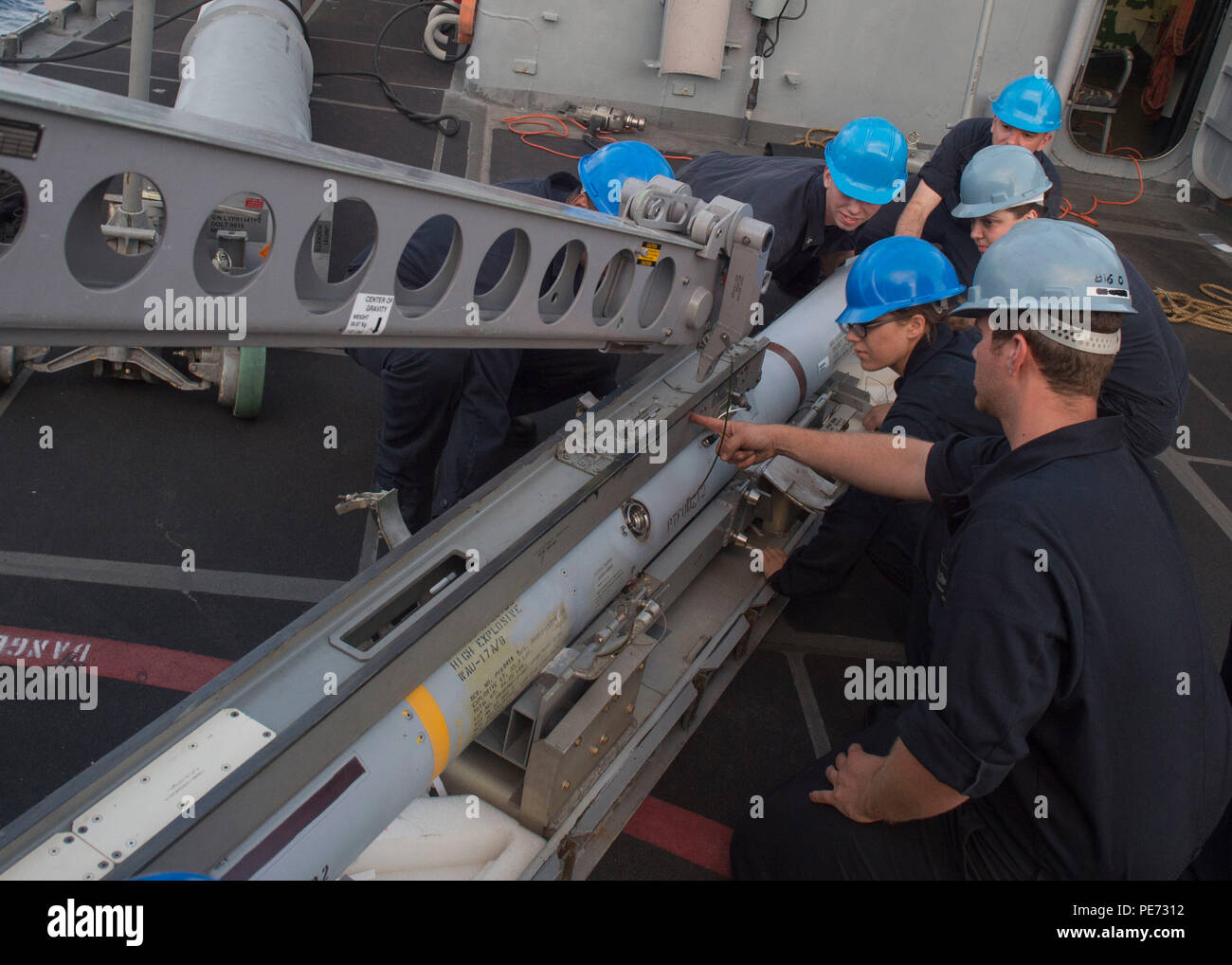 151010-N-AX638-131 ATLANTIC OCEAN (Oct. 10, 2015) Sailors attach the ...