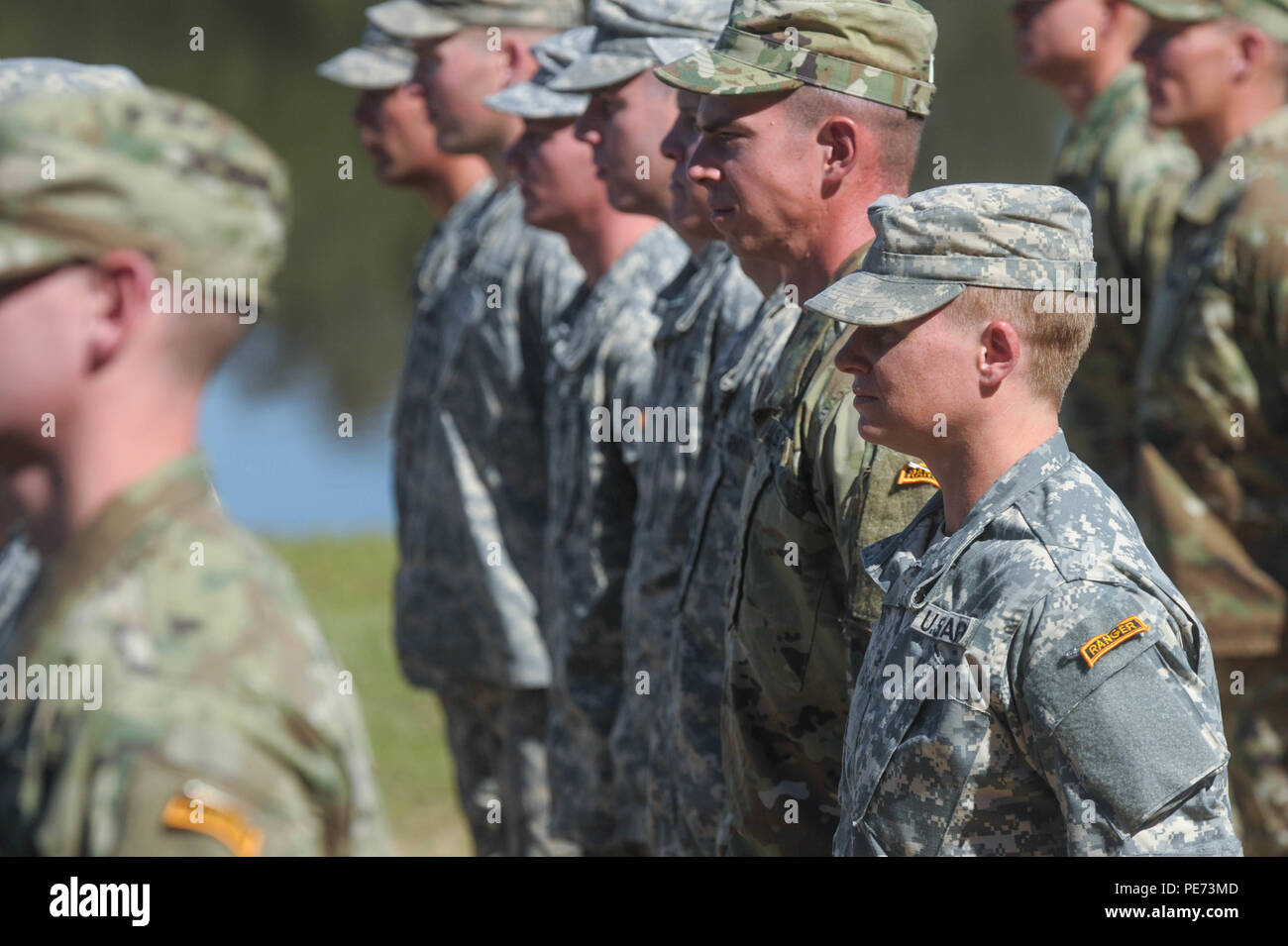 U.S. Army Maj. Lisa Jaster stands in formation during Ranger School graduation on Fort Benning, Ga., Oct. 16, 2015. Jaster is an Army reservist and the third woman to graduate Ranger School. (U.S. Army photo by Staff Sgt. Alex Manne/Released) Stock Photo