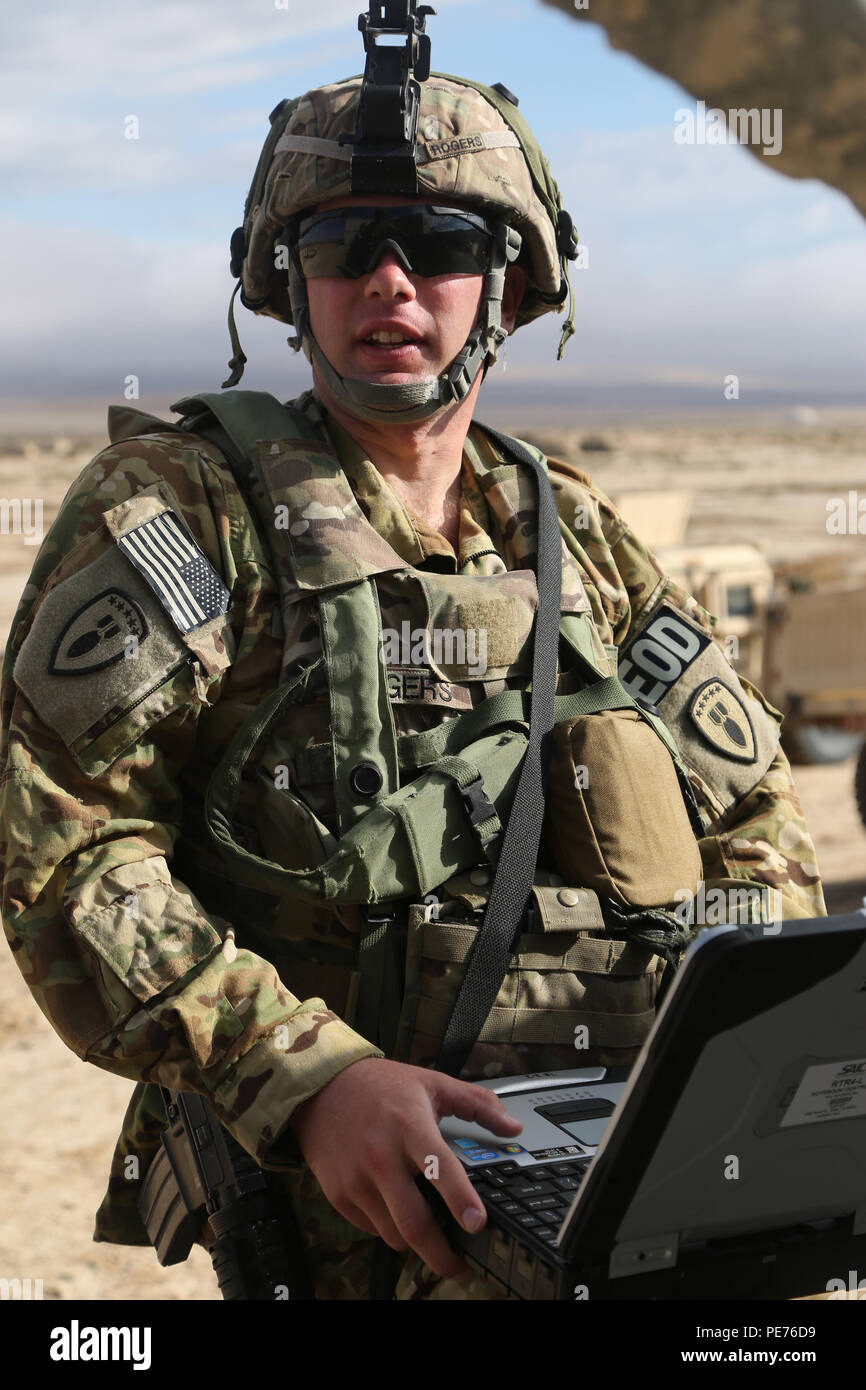 U.S. Soldiers assigned to the 2nd Battalion, 8th Infantry Regiment, 1st Armored Brigade Combat Team, 1st Cavalry Division, conduct public relations and security operations in the city of Razish during Decisive Action Rotation 16-01 at the National Training Center, Fort Irwin, Calif., Oct. 17, 2015. Decisive Action Rotations create a realistic training environment that tests the capabilities of Brigade Combat Teams preparing them to face similarly equipped opposing forces. (U.S. Army photo by Spc. Ashley Marble/Released) Stock Photo