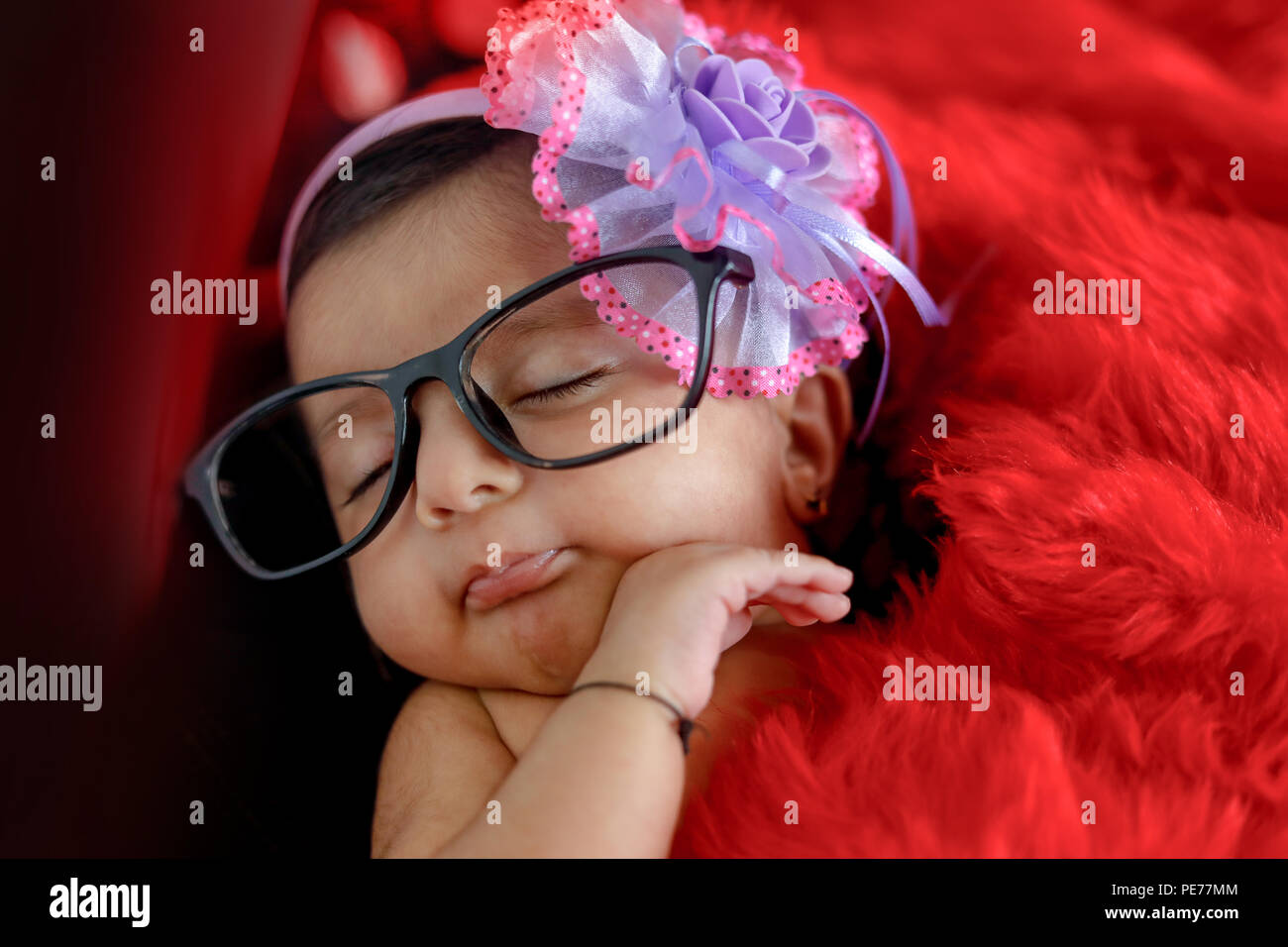 cute Indian baby girl on spectacles Stock Photo