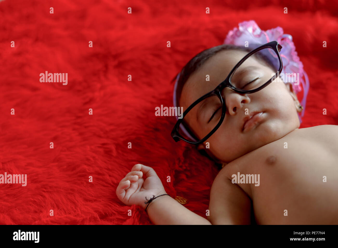 cute Indian baby girl on spectacles Stock Photo